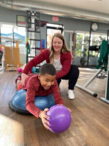 Spinal Rehabilitation Exercises with young kid