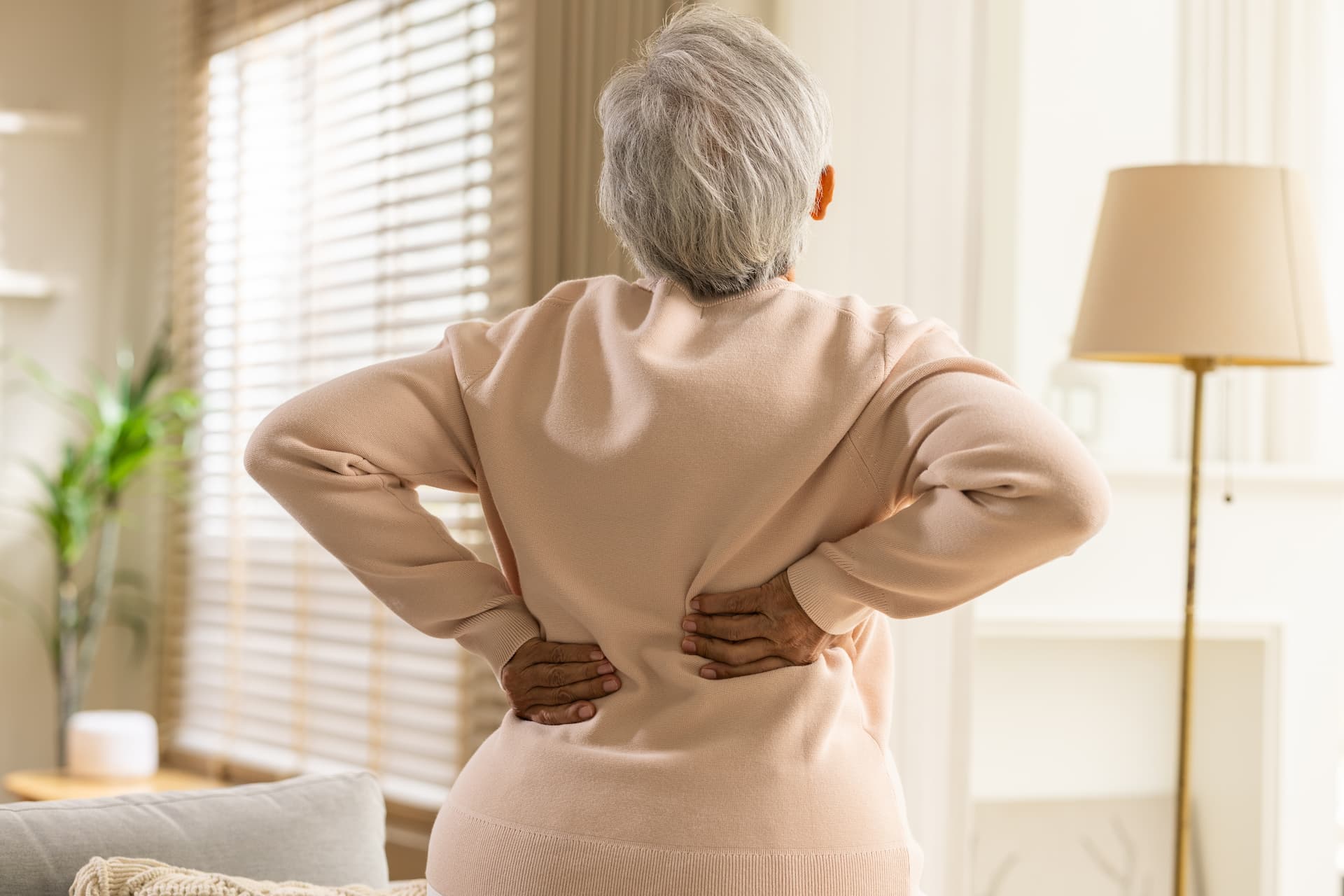 shutterstock_2775618831 (1) Elderly woman with back pain